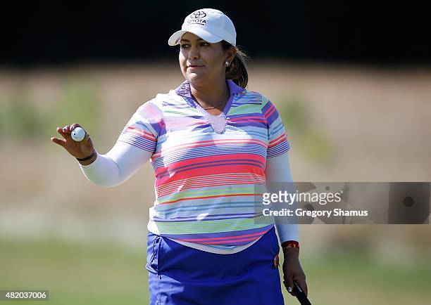 Lizette Salas waves to fans after making a par on the first green during the final round of the Meijer LPGA Classic presented by Kraft at Blythefield...