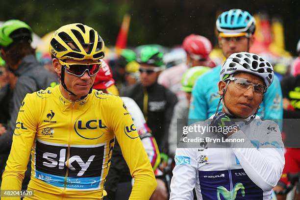 Overall winner Chris Froome of Great Britain and Team Sky talks with second placed Nairo Quintana of Colombia and Movistar Team during the twenty...