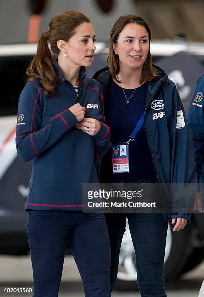 Catherine, Duchess of Cambridge with Rebecca Deacon at the Ben Ainslie Racing team base as she attends the America's Cup World Series event on July...