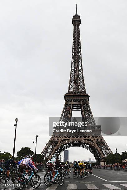 Chris Froome of Great Britain and Team Sky rides past the Eiffel Tower on his way to overall victory during the twenty first stage of the 2015 Tour...