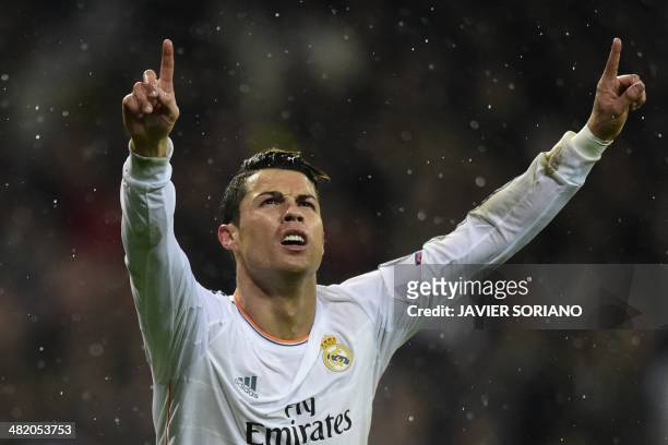 Real Madrid's Portuguese forward Cristiano Ronaldo celebrates after scoring during the UEFA Champions League quarterfinal first leg football match...