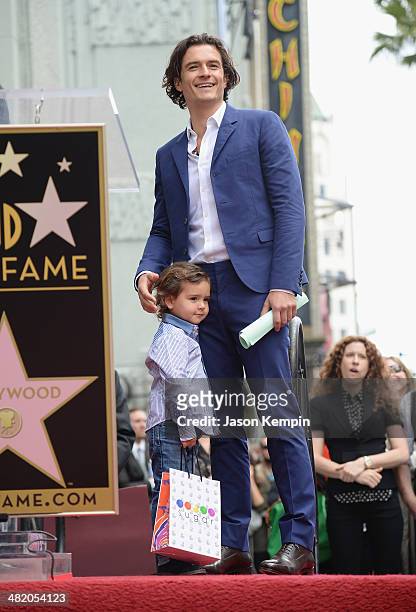 Actor Orlando Bloom and his son Flynn Bloom attend the Hollywood Walk of Fame celebration in honor of Orlando Bloom on April 2, 2014 in Hollywood,...