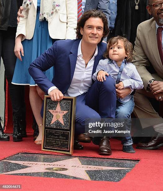 Actor Orlando Bloom and his son Flynn Bloom attend the Hollywood Walk of Fame celebration in honor of Orlando Bloom on April 2, 2014 in Hollywood,...