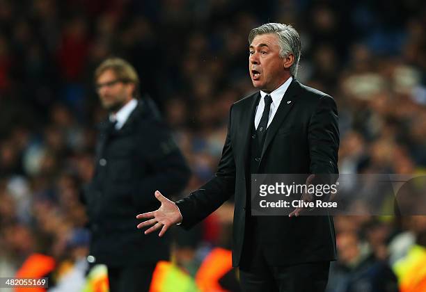Carlo Ancelotti, coach of Real Madrid reacts with Juergen Klopp, coach of Borussia Dortmund during the UEFA Champions League Quarter Final first leg...