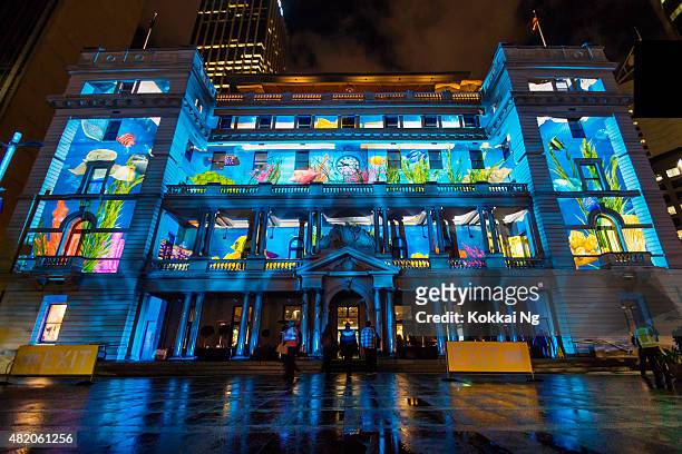 vivid sydney 2015 - customs house - vivid sydney stock pictures, royalty-free photos & images