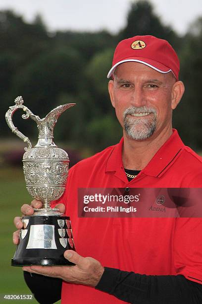 Marco Dawson of United States poses with the trophy after the final round of The Senior Open Championship played at the Old Course, Sunningdale Golf...