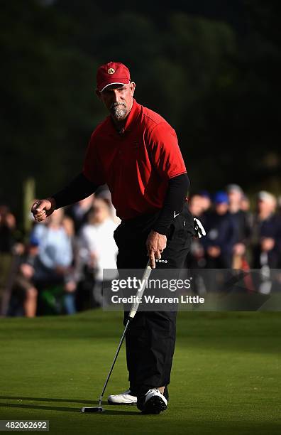 Marco Dawson of the USA putts on the 18th green to win The Senior Open Championship on the Old Course at Sunningdale Golf Club on July 26, 2015 in...