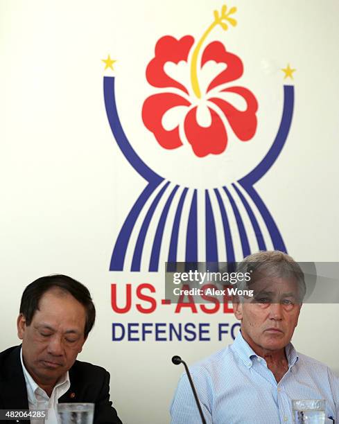 Secretary of Defense Chuck Hagel and Secretary General of ASEAN Secretariat Le Luong Minh listen during a minister roundtable April 2, 2014 in...