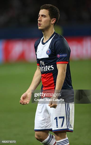 Eden Hazard of Chelsea wears the jersey of Paris Saint-Germain at the end of the UEFA Champions League quarter final match between Paris...
