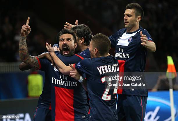 Ezequiel Lavezzi of PSG celebrates his goal with teammate Marco Verratti, Thiago Motta of PSG during the UEFA Champions League quarter final match...