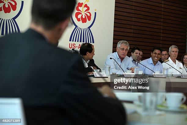 Secretary of Defense Chuck Hagel makes opening remarks as Commander of U.S. Pacific Command Admiral Samuel Locklear , Administrator of USAID Rajiv...