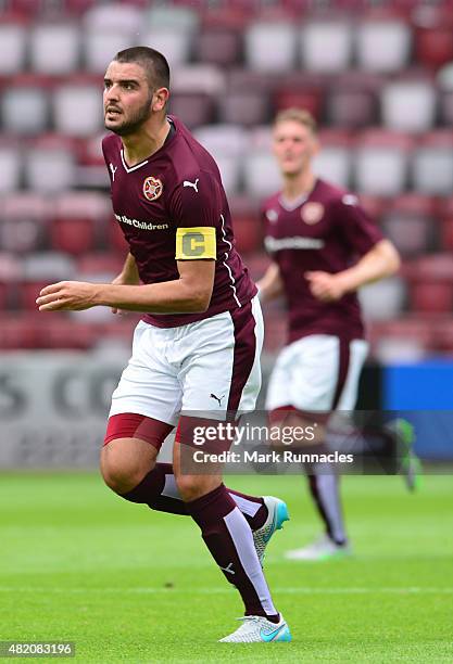 Alim Ozturk of Hearts in action during a pre season friendly match between Heart of Midlothian and Everton FC at Tynecastle Stadium on July 26, 2015...