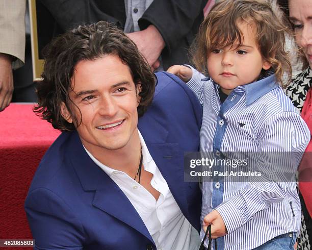 Actor Orlando Bloom with his son Flynn Bloom is honored with a Star on The Hollywood Walk Of Fame on April 2, 2014 in Hollywood, California.