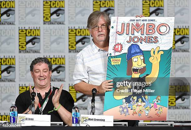 Producer/writer Al Jean looks on as producer/writer Matt Groening unveils the cover of the Jimbo Jones issue of Bongo Comics' Simpsons Comics...