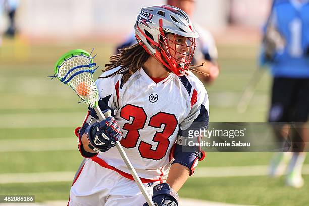 Josh Hawkins of the Boston Cannons controls the ball against the Ohio Machine on July 25, 2015 at Selby Stadium in Delaware, Ohio.