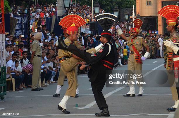 Pakistani rangers and Indian Border Security Force during a daily parade at the Pakistan-India joint check-post at Wagah border. India and Pakistan...