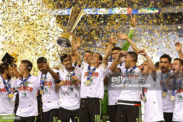 Andres Guardado of Mexico and teammates celebrate after defeating Jamaica in the CONCACAF Gold Cup Final at Lincoln Financial Field on July 26, 2015...