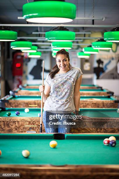 young woman in the pool hall - pool table stock pictures, royalty-free photos & images