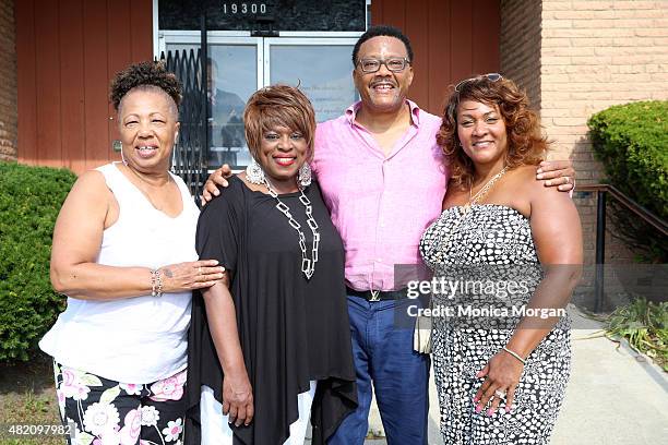 Earline Franklin, talk show host Mildred Gaddis, Judge Mathis, and his wife Linda Mathis poses at Mathis Community Center on July 26, 2015 in...