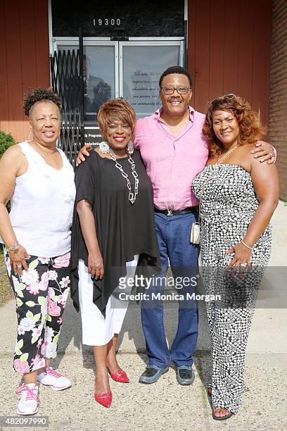 Earline Franklin, talk show host Mildred Gaddis, Judge Mathis, and his wife Linda Mathis poses at Mathis Community Center on July 26, 2015 in...