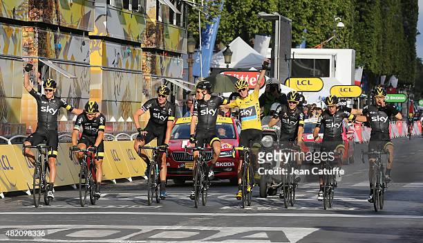Tour de France winner Chris Froome of Great Britain and Team Sky is surrounded by his teammates Luke Rowe of Great Britain, Nicolas Roche of Ireland,...