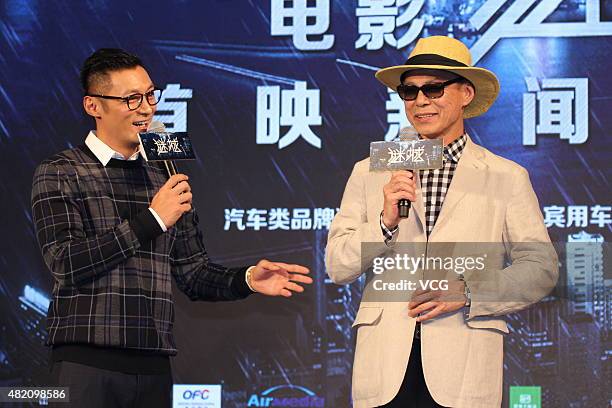 Actor Shawn Yue and director Ringo Lam attend the premiere press conference of film "Wild City" on July 26, 2015 in Beijing, China.