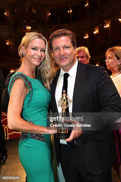 Francis Fulton-Smith and his wife Verena Klein with award during the 'Die Goldene Deutschland' Gala on July 26, 2015 at Cuvillies Theater in Munich,...