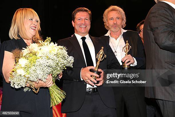 Patricia Riekel, Francis Fulton-Smith, Thomas Gottschalk with award during the 'Die Goldene Deutschland' Gala on July 26, 2015 at Cuvillies Theater...