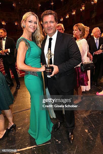 Francis Fulton-Smith and his wife Verena Klein with award during the 'Die Goldene Deutschland' Gala on July 26, 2015 at Cuvillies Theater in Munich,...