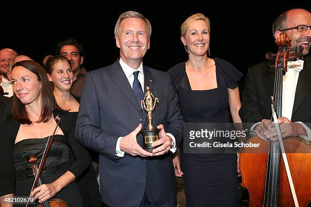 Christian Wulff with award and his wife Bettina Wulff during the 'Die Goldene Deutschland' Gala on July 26, 2015 at Cuvillies Theater in Munich,...