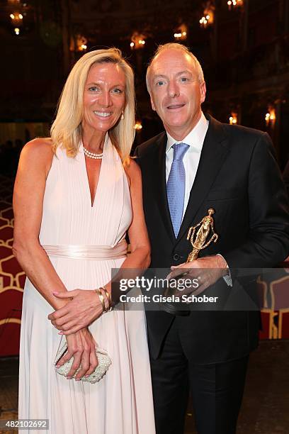 Richard Blackford with his wife Claire Blackford and award during the 'Die Goldene Deutschland' Gala on July 26, 2015 at Cuvillies Theater in Munich,...