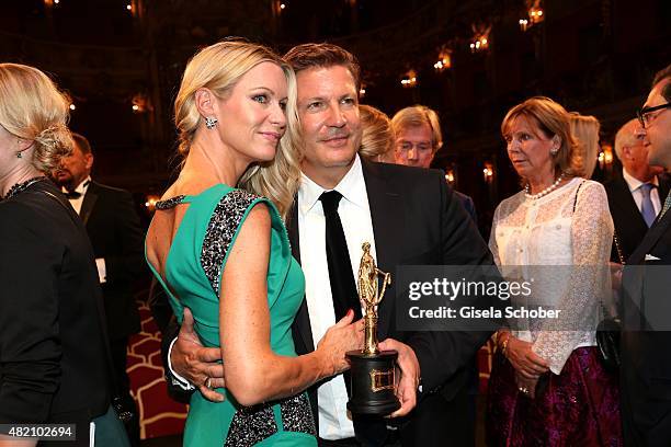 Francis Fulton-Smith and his wife Verena Klein with award during the 'Die Goldene Deutschland' Gala on July 26, 2015 at Cuvillies Theater in Munich,...