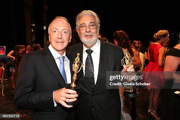 Richard Blackford, Placido Domingo with award during the 'Die Goldene Deutschland' Gala on July 26, 2015 at Cuvillies Theater in Munich, Germany.