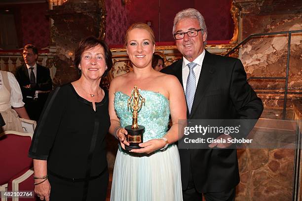 Diana Damrau and her mother Sybille Damrau and her father Rainer Damrau during the 'Die Goldene Deutschland' Gala on July 26, 2015 at Cuvillies...