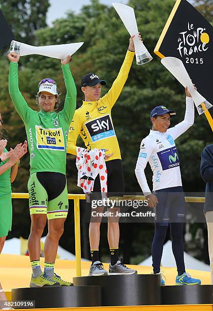 Winner of the Tour Chris Froome of Great Britain and Team Sky wearing the yellow jersey and holding the polka dot jersey for best climber is...