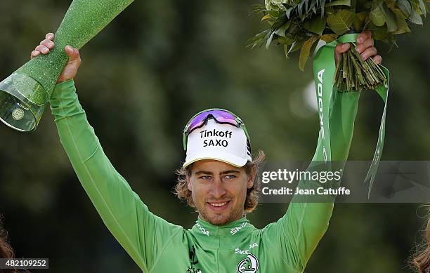 Peter Sagan of Slovakia and Tinkoff-Saxo celebrates winning the green jersey of best sprinter, following stage twenty one of the 2015 Tour de France,...