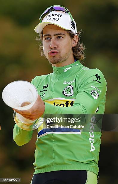 Peter Sagan of Slovakia and Tinkoff-Saxo celebrates winning the green jersey of best sprinter, following stage twenty one of the 2015 Tour de France,...