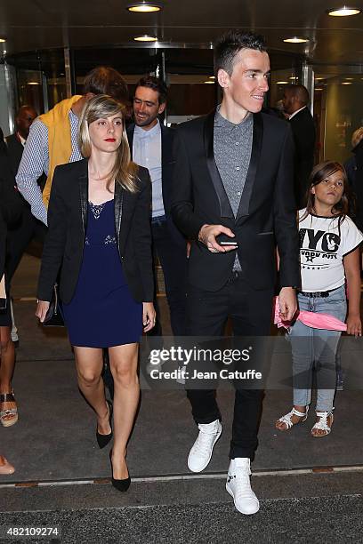 Romain Bardet of France and AG2R La Mondiale and his girlfriend leave their hotel for the team's party, following stage twenty one of the 2015 Tour...