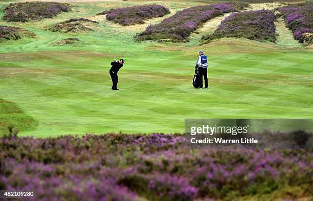 Peter Senior of Australia plays into the sixth green during the final round of The Senior Open Championship on the Old Course at Sunningdale Golf...
