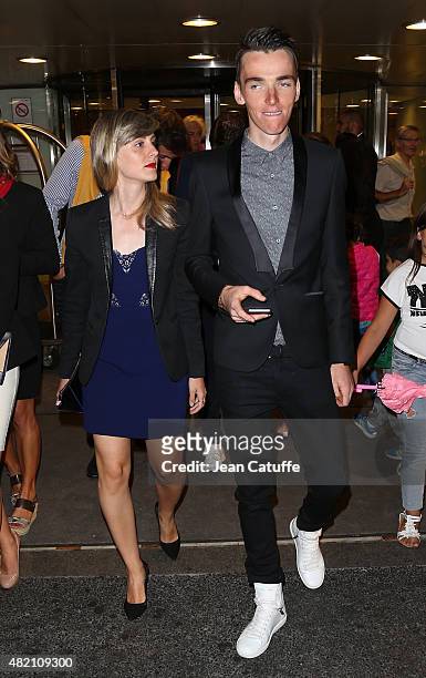 Romain Bardet of France and AG2R La Mondiale and his girlfriend leave their hotel for the team's party, following stage twenty one of the 2015 Tour...