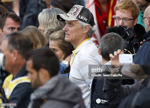 Oleg Tinkov, owner of Team Tinkoff-Saxo looks on during the trophy ceremony, following stage twenty one of the 2015 Tour de France, a 109.5 km stage...