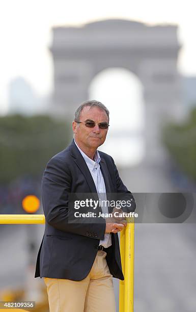 Bernard Hinault looks on during the trophy ceremony, following stage twenty one of the 2015 Tour de France, a 109.5 km stage from Sevres to the...