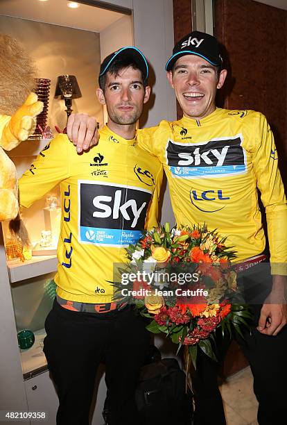 Wout Poels of the Netherlands and Team Sky and Luke Rowe of Great Britain and Team Sky wear the yellow jersey of their leader, Chris Froome,...