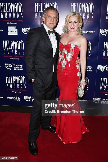 Simon Burke and Helen Dallimore arrives at the 2015 Helpmann Awards at the Capitol Theatre on July 27, 2015 in Sydney, Australia.