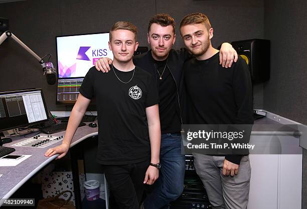 Sam Smith and Disclosure visit Rickie, Melvin and Charlie on KISS FM Breakfast show at Kiss FM Studios on June 30, 2015 in London, England.