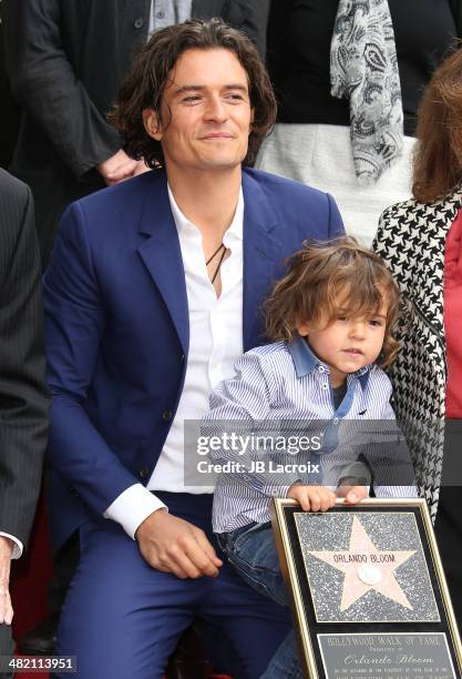 Orlando Bloom and his son Flynn Bloom attend the Hollywood Walk of Fame celebration in honor of Orlando Bloom on April 2, 2014 in Hollywood,...