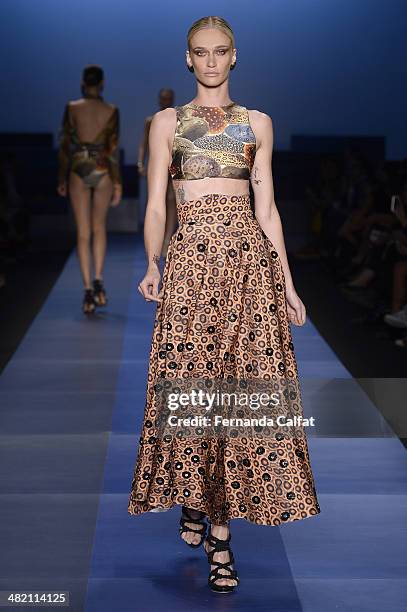 Vivi Orth walks the runway during the Agua de Coco por Liana Thomaz show at Sao Paulo Fashion Week Summer 2014/2015 at Parque Candido Portinari on...