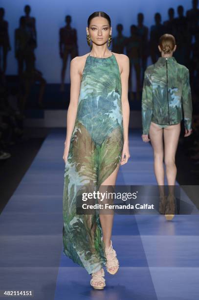 Bruna Tenorio walks the runway during the Agua de Coco por Liana Thomaz show at Sao Paulo Fashion Week Summer 2014/2015 at Parque Candido Portinari...