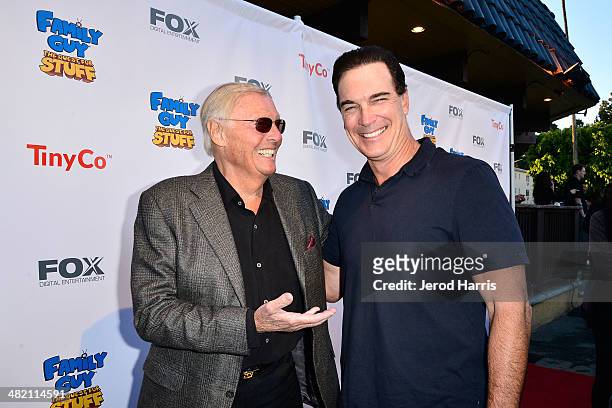 Adam West and Patrick Warburton attend the Launch Party for the 'Family Guy' Game at the Happy Ending Bar & Restaurant on April 2, 2014 in Hollywood,...