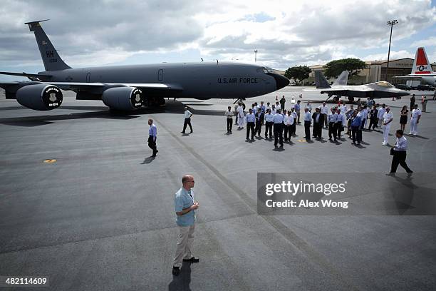 Secretary of Defense Chuck Hagel participates in a tour with his counterparts from Southeast Asia April 2, 2014 at Hickam Air Force Base in Honolulu,...